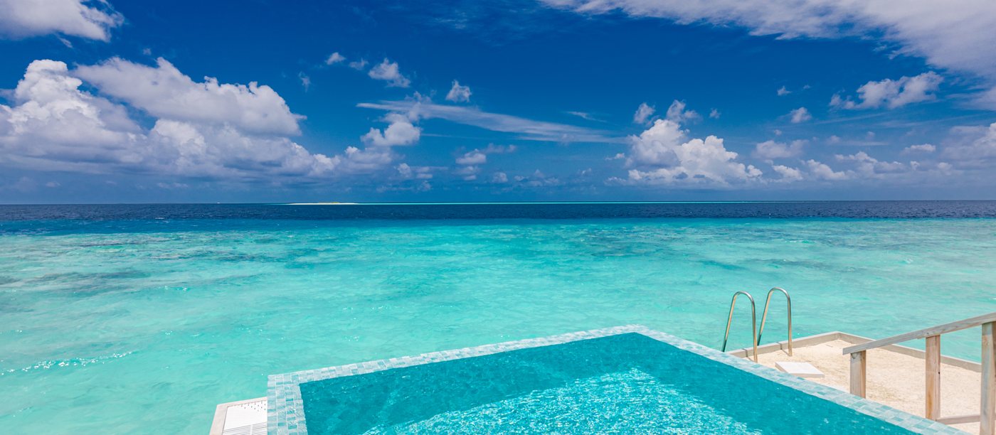 An infinity pool running out to open sea.
